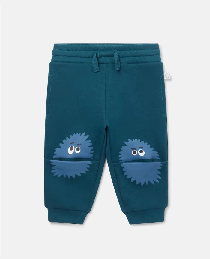Stella McCartney Monster Face Knee Patch Joggers Blue Multicolour Kids Pants and Shorts Stella McCartney Monster Face Knee Patch Joggers Blue Multicolour Kids Pants and Shorts