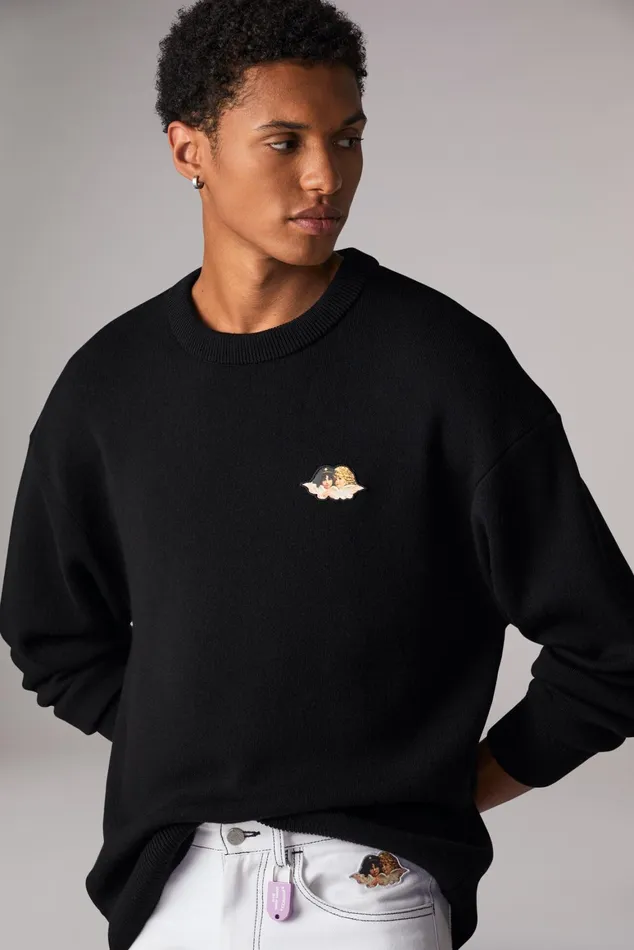 WomenMen Fiorucci Sweatshirts and Hoodies Unisex Icon Angels Knit Jumper Black WomenMen Fiorucci Sweatshirts and Hoodies Unisex Icon Angels Knit Jumper Black