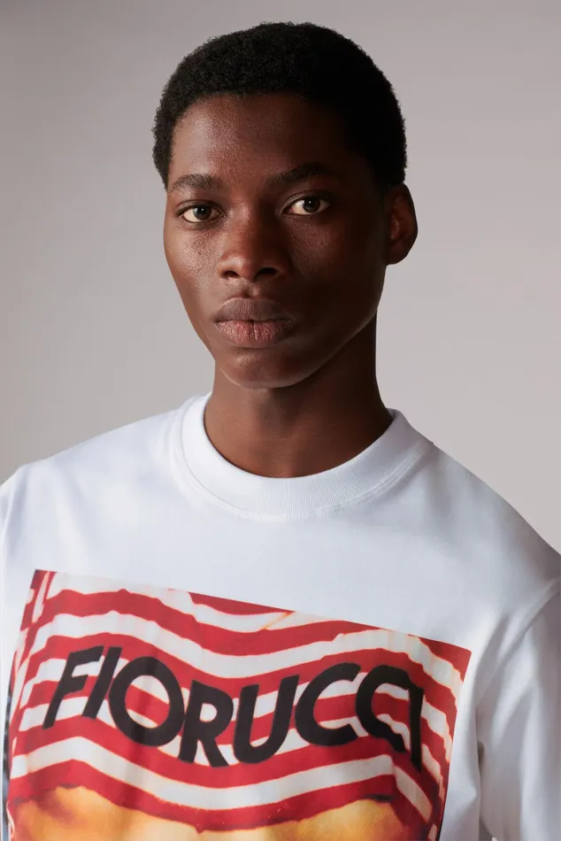 WomenMen Fiorucci TShirts and Tops Unisex Logo Stripe Graphic TShirt White WomenMen Fiorucci TShirts and Tops Unisex Logo Stripe Graphic TShirt White